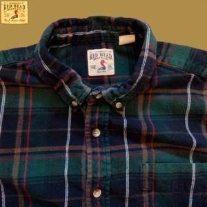 Red head plaid shirt.